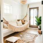 A_corner_of_an_entryway_with_a_woven_hanging_hammock-10-1200x1200